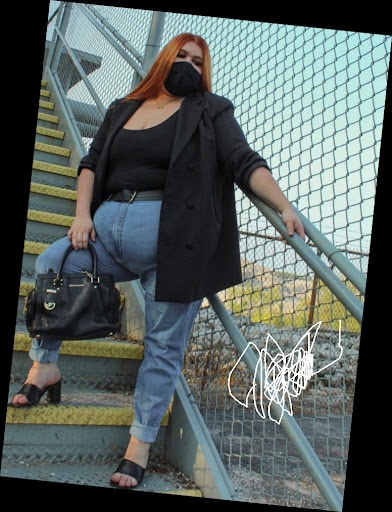Some Chic Office Outfits for Plus Size Queens, style with class! 8 A plus size woman in Oversized black double-breasted blazer Black scoop-neck bodysuit/top Light wash high-waisted mom jeans (cuffed) Black leather belt Black square-toe heeled mules Black leather satchel bag Black face mask