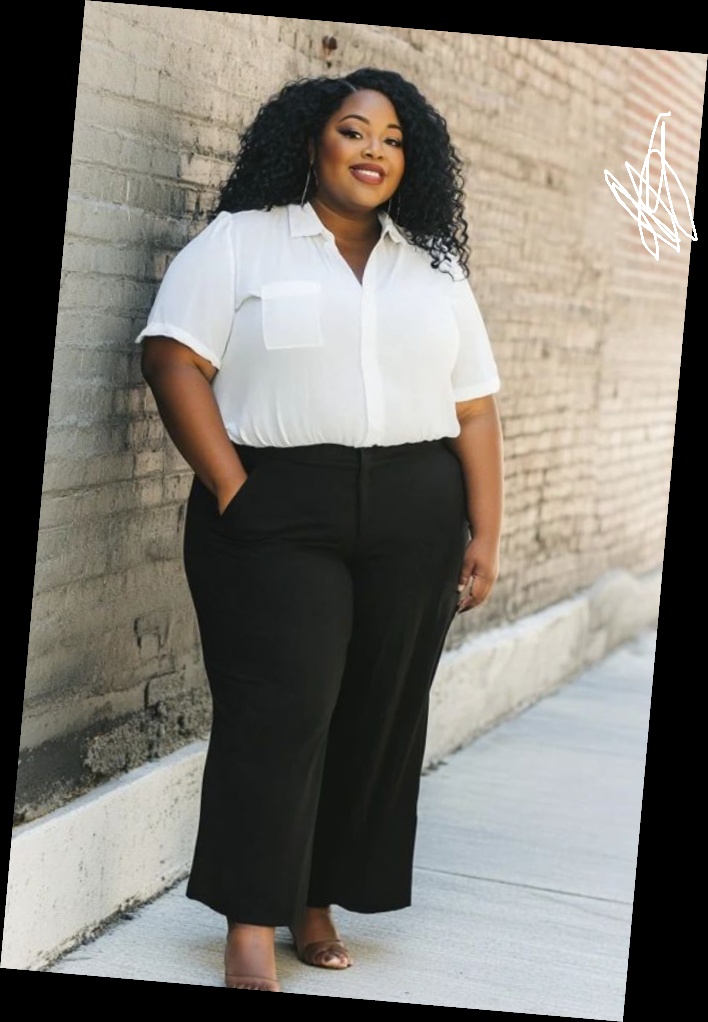 A plus size woman in a White short-sleeve button-down shirt with chest pocket Black high-waisted wide-leg trousers Nude/Tan strappy heeled sandals Long silver earrings