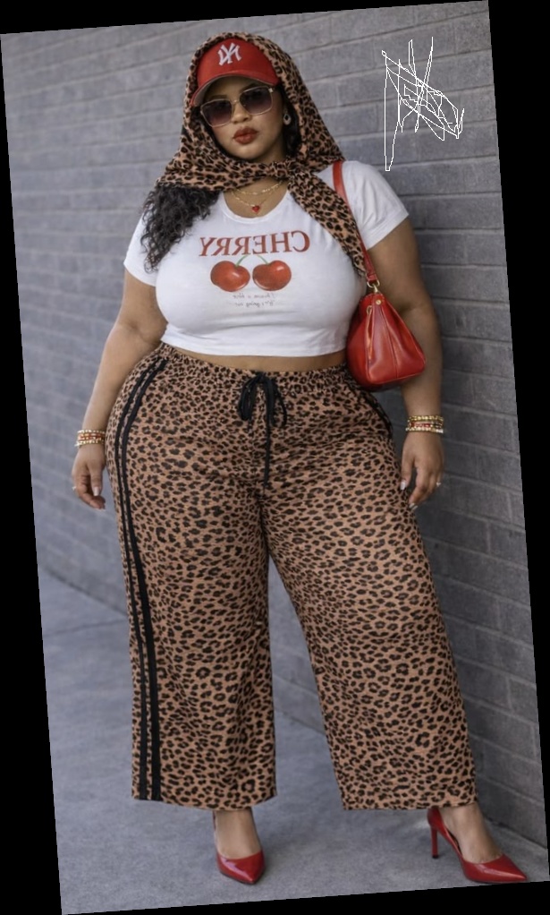 Right here are some pretty much affordable outfits for every plus size queen 2 A plus size woman in Leopard print headscarf Red baseball cap (NY logo) White "CHERRY" graphic crop top Leopard print wide-leg track pants with side stripes Red pointed-toe pumps Red leather shoulder bag Oversized square sunglasses Gold heart pendant necklace Gold bangle bracelets