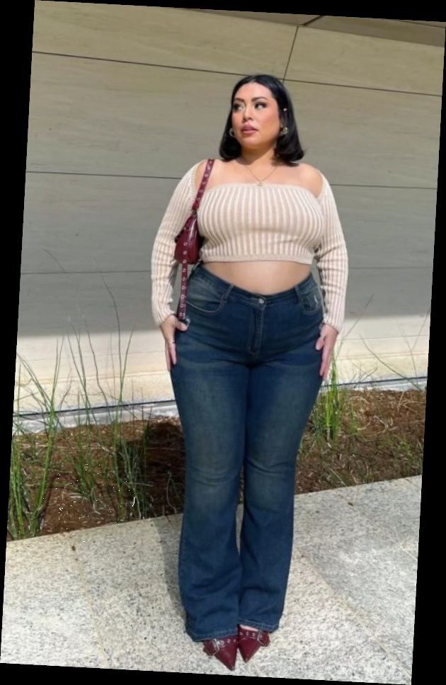 For this fall, I put together this list of some awesome fits for the beautiful plus size queens 10 A plus size woman wearing Tan ribbed off-the-shoulder long sleeve crop top Dark wash flare jeans Dark red pointed-toe buckled heels Dark red shoulder bag