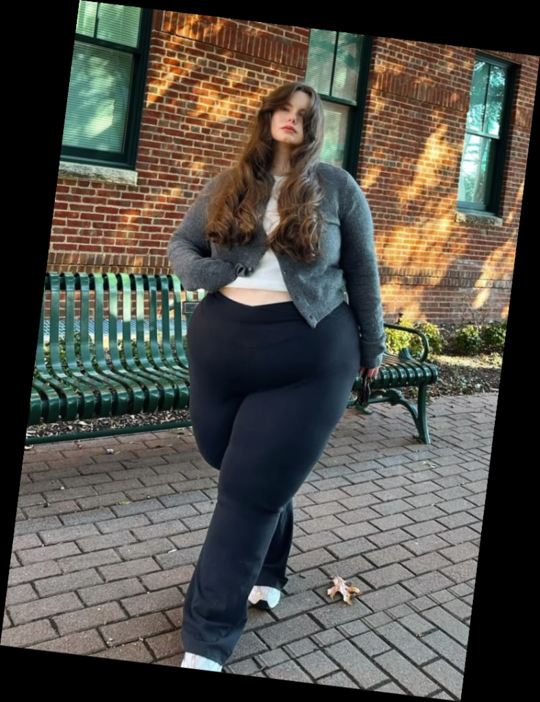 For the baddie girlies, here are some ways to eat up that baddie look 9 A plus size woman in Grey knitted cardigan White crop top Black leggings White sneakers