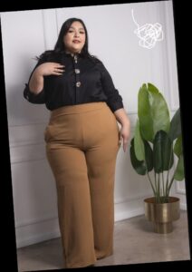 A plus size woman in Elevated Blouse & Trousers